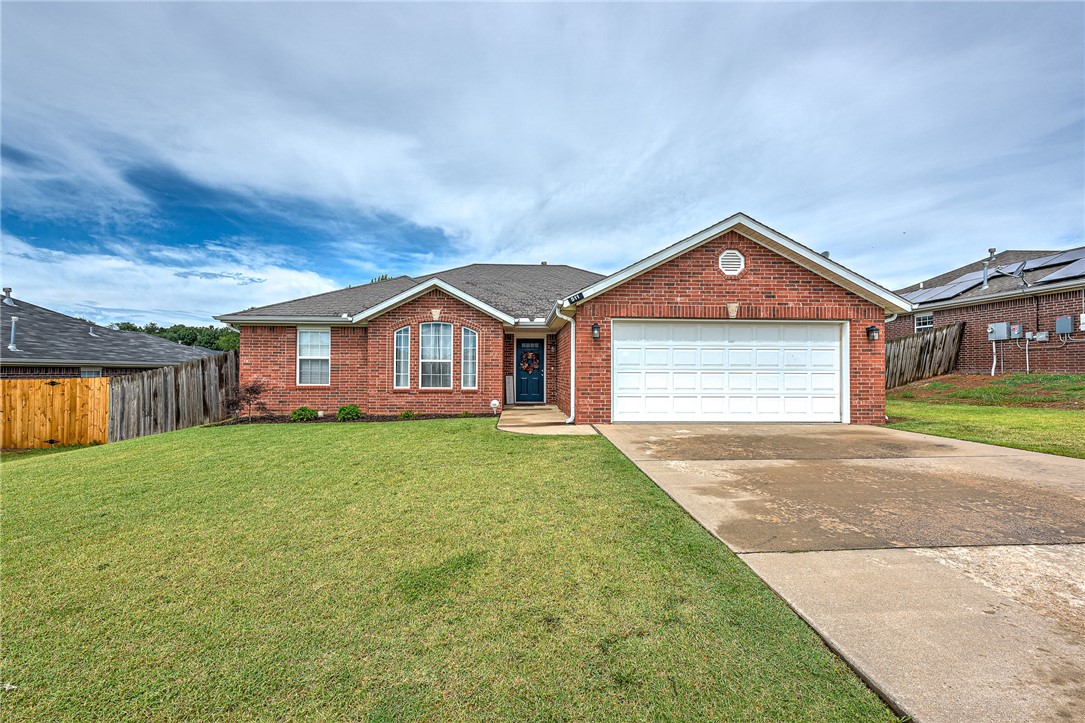 $5,000 CLOSING COST CREDIT WITH ACCEPTABLE OFFER!! Fantastic investment opportunity just minutes from the new Walmart HO and all things Bentonville! NEW HVAC and WATER HEATER! Walk in to find a large open living room with gas fireplace leading into a spacious kitchen with ample cabinetry and countertop space, complimented by eat-in dining and large windows. The split floor plan offers privacy - large primary suite with double vanity, jetted tub and separate walk-in closets along with the laundry room can be found on the north side of the home. Two bedrooms and a full bathroom are located to the south. Outside features a large covered patio and a meticulously cared for lawn! Carpets have been recently cleaned, Vivint security system to convey, washer/dryer can convey as well. Priced to sell - schedule your tour today!