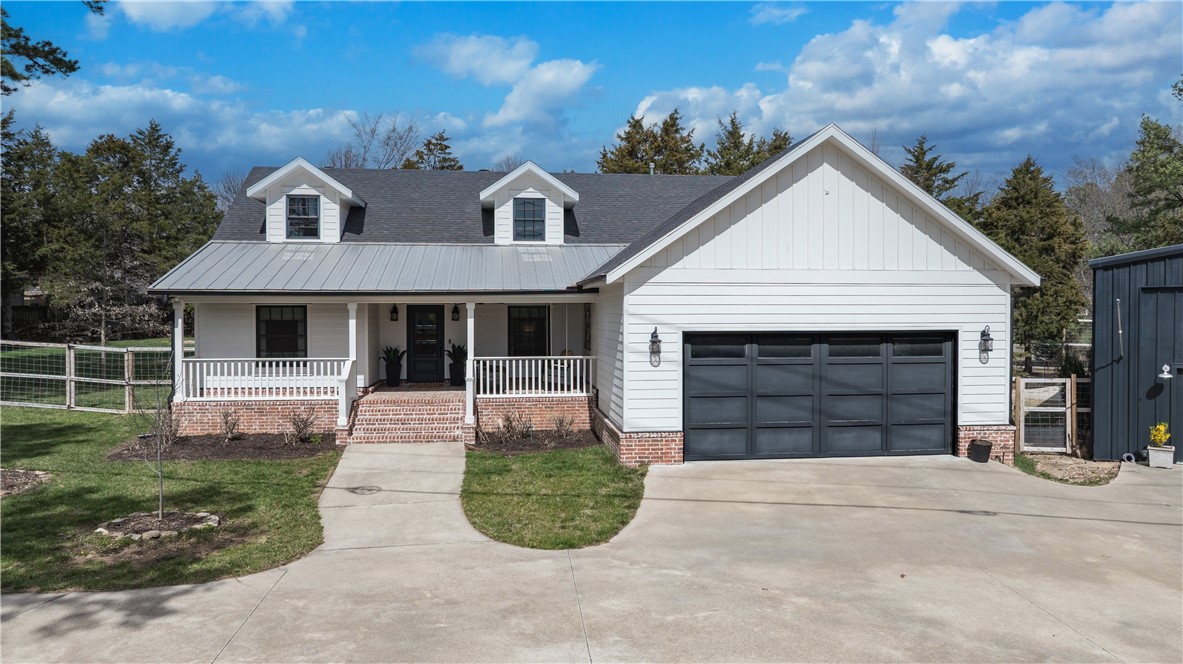 Exquisite home is the perfect blend of luxury, comfort, and practical elegance with thoughtful high-end designer touches throughout. A spacious open floorplan features custom built-ins, striking fireplace, & beautiful shiplap accents. Kitchen has a center island, sleek countertops, stainless appliances, & butlerās pantry. Home office perfect for work or study. Master bedroom is serene & generously sized; en-suite bath has a tiled steam shower. Beautiful lighting fixtures & thoughtfully chosen finishes elevate this homeās aesthetic.
This impressive 2,400 sq. ft. detached building (40'w x 60'd) offers a versatile space that combines comfort & function. Building is equipped with A/C throughout. Kitchen area has butcher block countertops, double sink, dishwasher, electric for a refrigerator & plenty of space for storage. Loft with two beds & full bath adds a unique touch. Space also includes a 9'x12' laundry area; tankless water heater, & air filtration system. Property is gated. Yard is irrigated & fully fenced.