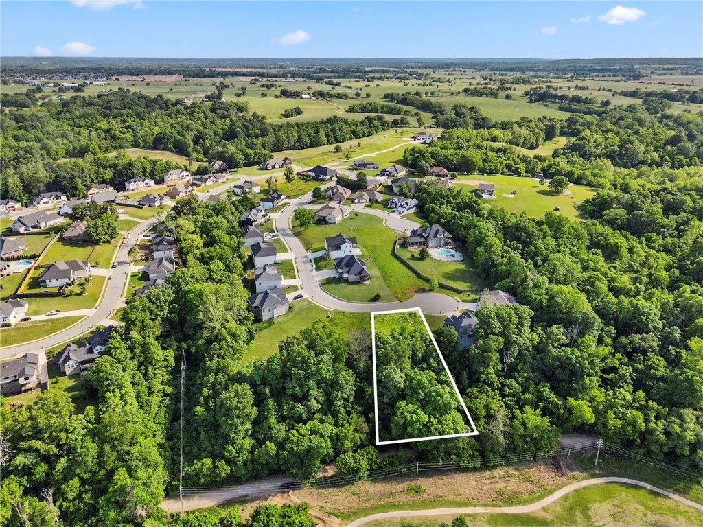Build your dream home on Lot 36 Hopkins Lane in Pea Ridge’s Sugar Creek Residential Community. This gently rolling lot sits near the end of a quiet cul-de-sac with views of Big Sugar Golf Course. All utilities are at the street, and you're just minutes from schools, shopping, and everything NWA has to offer.
Adjacent Lot 37 is also available for added space or a second homesite.