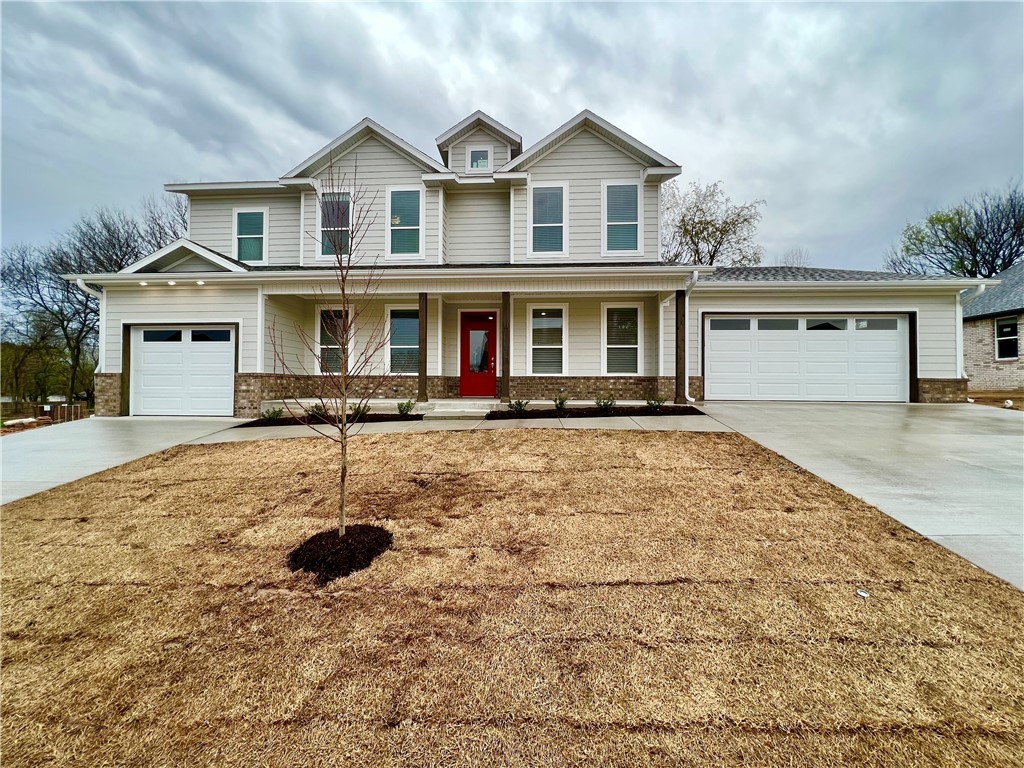 Must see new construction probuilt farmhouse style home. Step up to the front door on this covered front porch that is welcoming to you and your guest. Enter into this open floor plan with kitchen island, gas cooktop range w/ built in air fryer, gas-log fireplace in living room, stylish and durable luxury vinyl plank flooring and so much more. Located near Prairie Grove Battlefield State Park.
