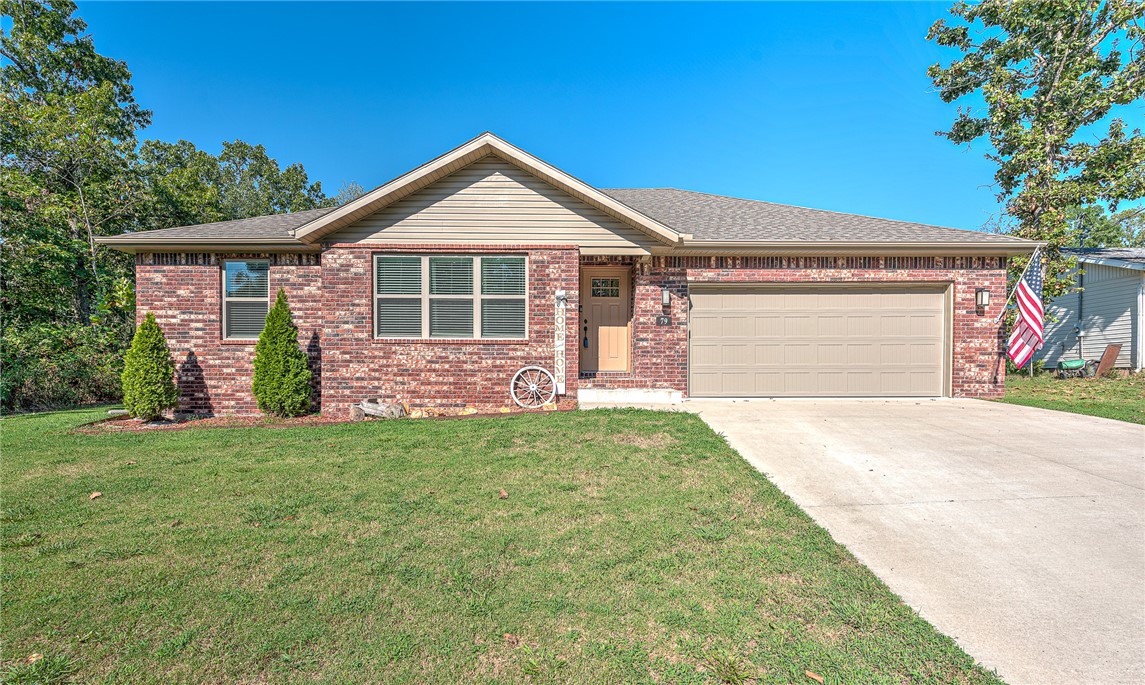 Why Wait to Build? This Like-New Home Has It All! Charming 2021 one-level brick home with 2 bedrooms plus a versatile bonus room, perfect for an office, den, or hobby area! Enjoy low-maintenance living with beautiful LVP flooring throughout. The open layout creates a bright and inviting space, while the flat, flat, flat backyard is a true gem—ideal for entertaining, gardening, or relaxing. Just five minutes to Branchwood Nature Trail and Highlands Golf and Pub. This location can't be beat!