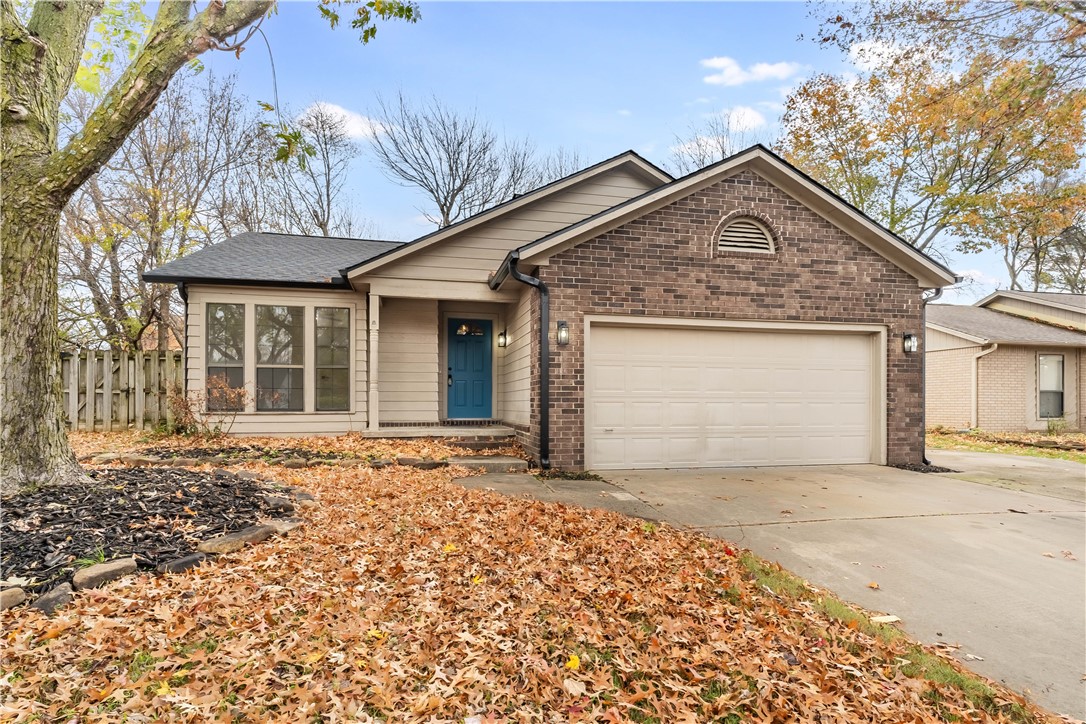 Walking distance to Washington Regional Hospital in the heart of Fayettevilleās business district, this adorable home has a ton of updates. Large picture windows overlook the mature tree out front with a sitting porch leading inside. Natural light lovers will be obsessed with this home. It has laminate wood floors through the living room and bedrooms, and tile in all wet areas. The living room has vaulted ceilings with a wood beam, a skylight, and a stylish gas fireplace below that. All countertops in the kitchen and bathroom are granite, and all cabinetry is a cool blue color with gold accent pulls. Enjoy three big bedrooms and two nice bathrooms. The star of the show is the sunroom, with stellar views of the large privacy-fenced backyard and access to the spacious deck. Storage shed out back, too!