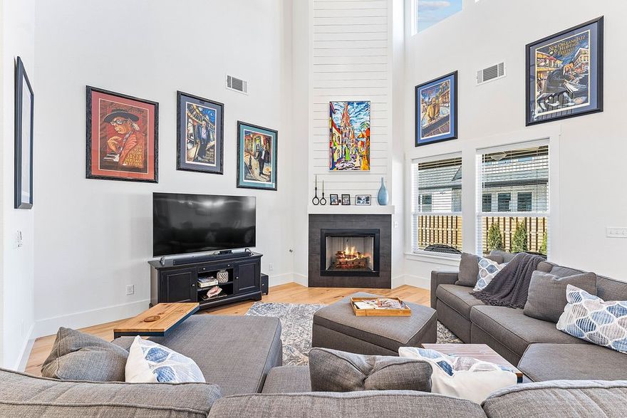 Luxury, lifestyle, like-new—without the wait. 2025 build outshines new & is packed w/ upgrades! Sellers invested $12K+ in elevated features for high-end style and function. Quartz countertops shine in designer kitchen w/ bar seating, eat-in area, plus separate DR ready for gatherings. Custom wine bar w/ fridge means entertainment-ready! Pantry has added electrical for appliances to keep counters clutter-free. Soaring ceilings throughout, incl dramatic 22 ft LR ceiling open to 2nd floor. MBR features coffered ceiling, spa-inspired MBA w/ dbl sinks, and huge walk-in closet w/ built-ins & extra hanging. Another BR down and upstairs: 2 well-sized BRs w/ walk-in closets J+J full bath, ideal for guests, kids or office. BONUS:walk-in attic storage! 3-Car garage w/ high ceilings + overhead shelving. Covered patio prewired for TV. Fast-grow arborvitae trees planted for future privacy. Silver Leaf Estates amenities: clubhouse, pool, pet wash, kids play area, pond w/ fountain, walking trails, benches, dog park (coming soon).