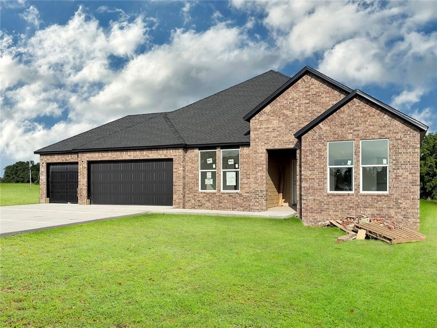 Gorgeous Garland plan with a 3-car garage in Monitor Meadows, where you'll experience modern luxury in Springdale, Arkansas. Our meticulously crafted floor plans provide ample space for you to grow and thrive. Bedroom 1 will have a fan and your fabulous en-suite will have an oversized walk-in shower, elongated commode and quartz counters. You'll find fantastic quartz counter tops also in the kitchen with tile backsplash and 42-inch upper cabinets. Black plumbing fixtures throughout! LED lighting throughout! Living room will have a fan and a modern electric fireplace with a poplar mantle. Septic sewer and Private Streets.