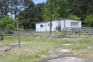 Ready for your new business? This could be the place you have been waiting for. Just inside Pottsville city limits, 1.64 Acres, 1200 sq ft metal building,Convenient location, easy access to I-40 and Russellville. Take a look.