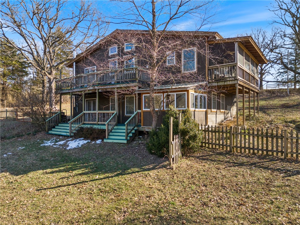 Seller now offering $5,000 concession towards buyer closing costs! Discover this exceptional 3-bedroom, 3-bath, 2,134 sq. ft. home on 22.37 acres with approximately 300 feet of Kings River frontage. The property also includes a 464 sq. ft., 1-bedroom, 1-bath additional home with a full kitchen and washer/dryer, ideal as a guesthouse, studio, or rental. The main home features an in-ground liner pool, solar panels, solid wood floors, open living spaces with updated washer/dryer and dishwasher, ample storage, large windows, and a newly added front deck. The walk-out basement includes a kitchenette, wood-burning stove, tool storage room, and a room perfect for an art studio with plenty of natural light. Additional highlights include a sunroom, multiple living areas, an indoor storm room, and central heat (no A/C). The land offers partially fenced woods and pasture, a garden, fruit trees, and peaceful views. Located just 15 minutes from Berryville and under 20 minutes from Eureka, this property is full of potential!