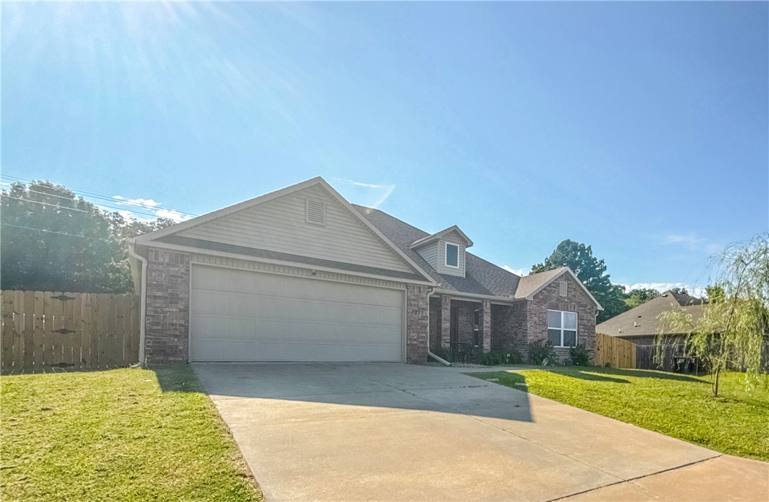 Well maintained, all brick home offering 4 bedrooms, 2 bath, split floor plan perfect for 1st time home buyers and small families all while staying close to all local amenities. Updates include: gas utility connection, all new carpet with premium cushion padding, paint throughout, gutters and fencing done in 2025, new refrigerator, dishwasher, and gas range. When stepping inside you'll notice the large primary bedroom strategically tucked away in the back of the home with its own primary bathroom. The kitchen provides plenty of counter top space and pantry perfect for storing all the kiddo's snacks. This home provides a large backyard with its privacy fence ideal for pets. Located in Oakleaf Manor Subdivision, this property is just a few minutes from all amenities; 5 minutes to the local grocery store, 6 minutes to Elkin Schools, 16 minutes to Fayetteville, 20 Minutes to U of A.