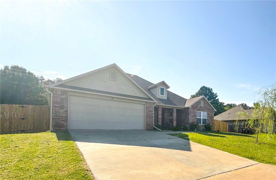 Well maintained, all brick home offering 4 bedrooms, 2 bath, split floor plan perfect for 1st time home buyers, small families, or buyers looking to downsize all while staying close to all local amenities. Updates include: gas utility connection, all new carpet with premium cushion padding, paint throughout, new refrigerator, dishwasher, and gas range. When stepping inside you'll notice the large primary bedroom strategically tucked away in the back of the home with its own primary bathroom. The kitchen provides plenty of counter top space and pantry perfect for storing all the kiddo's snacks. This home provides a large backyard with its privacy fence ideal for pets. Located in Oakleaf Manor Subdivision, this property is just a few minutes from all amenities; 5 minutes to the local grocery store, 6 minutes to Elkin Schools, 16 minutes to Fayetteville, 20 Minutes to U of A.