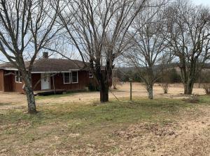Good Investment Property. 2 Bedroom and 1 Bath home on 16.88 Acres M/L. Home has had some remodeling done. City water is available.Property consists of homesite, pastor, and wooded.