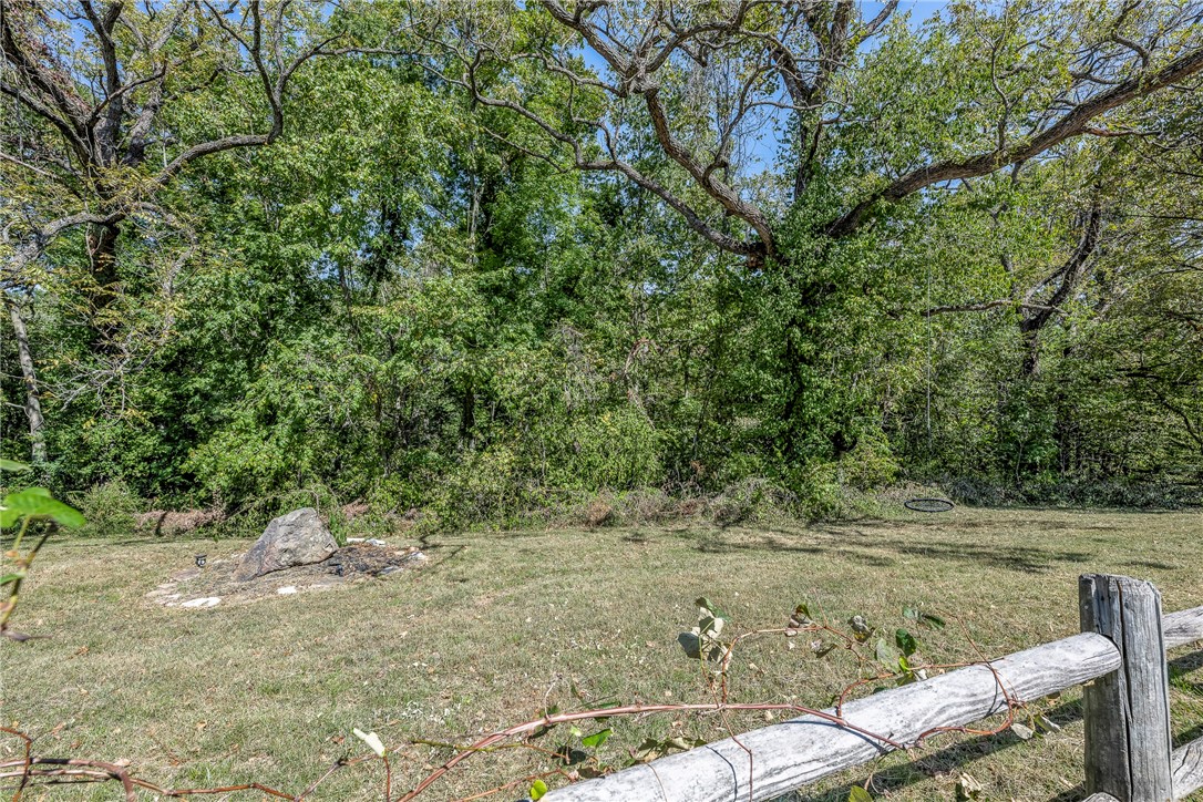 1.04 Acres wooded but majestic. Has sewer availabe. Really close to everything. Nice landscape has a lot of potential.