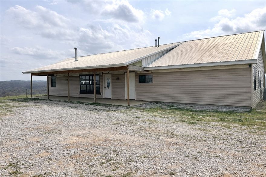 Perched on a scenic hilltop, 488 Madison 6606 in Huntsville, AR offers breathtaking 360-degree views and peaceful country living at its finest. This custom-built 4-bedroom, 2-bath home sits on 67± acres of prime Northwest Arkansas land, perfectly set up for cattle or a working farm with full fencing, hay barn, and corrals already in place. The property blends open pasture with rolling terrain, creating both functionality and beauty. Located just minutes from War Eagle Creek, you’ll enjoy quick access to fishing, floating, and outdoor recreation, while still being a short drive to Huntsville and Springdale. This is an ideal opportunity for those searching for Arkansas land for sale, a cattle ranch, or a private homestead with acreage and views. Whether you’re looking to run livestock, enjoy hunting, or simply take in the sunsets, this property delivers.