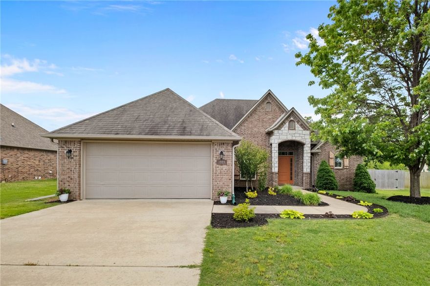 Discover comfortable, easy living in this beautiful home located in the sought-after Cornerstone Ridge neighborhood. Move-in ready and ideally located under 20 minutes from both Walmart Headquarters and XNA Airport. Cornerstone residents enjoy access to over 17 acres of cleared green space and a variety of amenities, including a neighborhood pool, playground, walking and fitness trails, and a stocked fishing pond. Inside, you’ll find thoughtful details and a cozy gas fireplace that add both character and comfort. The open, eat-in kitchen offers granite countertops, a brick archway w/breakfast bar, and plenty of cabinet space—making it ideal for both everyday living and entertaining. Out back, an extended patio with 2 fire features and a pergola creates the perfect setting for gatherings or quiet evenings outdoors. As an added bonus, the garage has a mini split attached and extra insulated walls making the area heated and cooled for endless possibilities. Frige, Washer & Dryer are included with an acceptable offer.