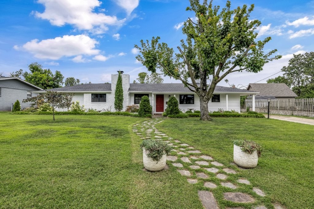 Fully remodeled 3bed/2.5bath mid-century home in downtown Rogers! Features a brand-new primary suite addition, original 50s glass louvers in sunroom, remodeled kitchen, new roof, Anderson windows, new hardwood floors, and a cozy reading nook with built-ins. Large lot with open patio & new deck, oversized 2-car garage. Short walk to downtown restaurants, parks & festivities. Vintage charm + modern updates.