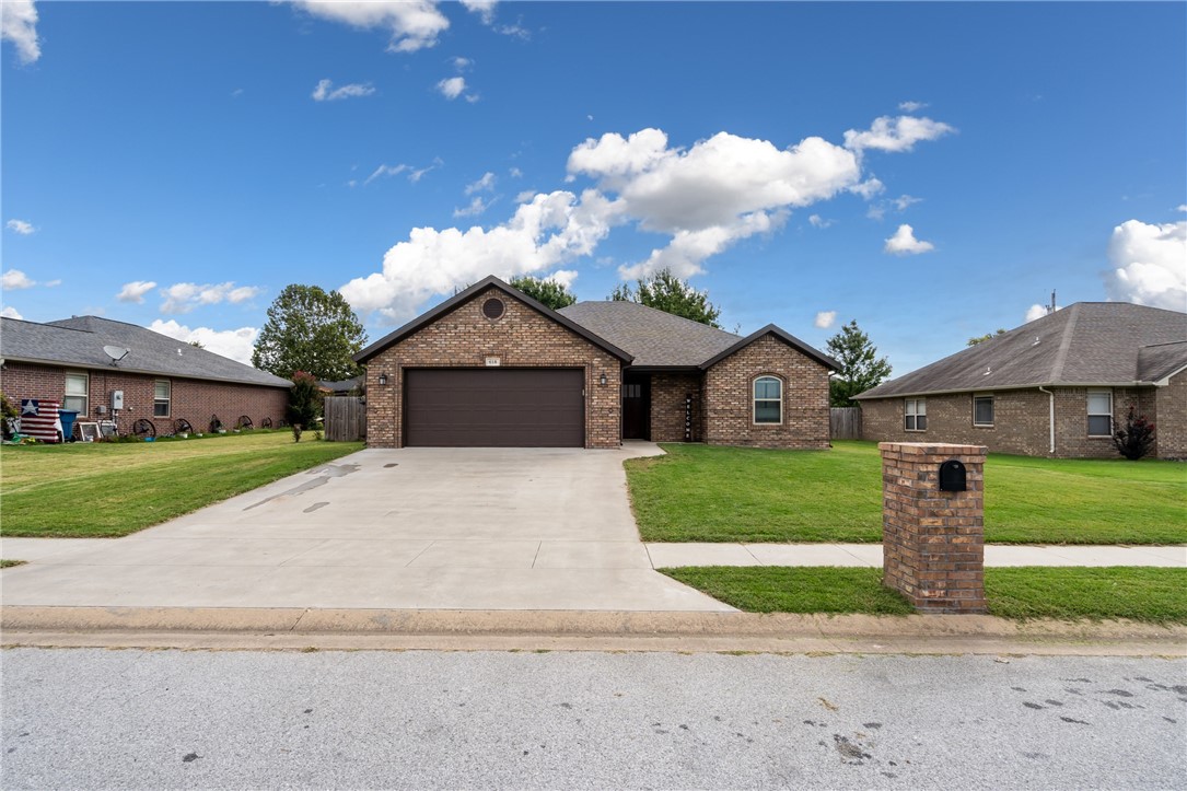 3 bedrooms, 2 bath, 1594sf. Open floor plan. Granite counters, SS appliances, gas range, & pantry in kitchen. Living area is wired for surround sound. Wood flooring in main living areas, tile in wet areas, carpet in bedrooms. Large primary bedroom. Primary bath has tile shower with glass doors, double sinks, and double closets. LAN connections from LR to east guest bedroom(used as office). Enjoy BBQs with friends under the covered porch inside the privacy-fenced backyard. Pre-wired for a hot tub and TV/entertainment. 2 car garage with added lighting & wireless opener. Mirror & accessories to convey in LR-covers alternate wall outlets for option of hanging TV.