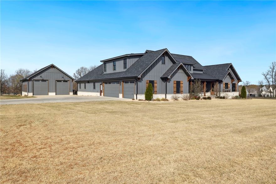 Nestled in the coveted gated community of Highlands at Elm Springs, this exceptional estate offers the perfect blend of luxury, privacy, and comfort. Set on a sprawling 2.5-acre lot, the home features a spacious 3-car garage and a beautiful, resort-style pool, perfect for relaxing or entertaining. A fully equipped in-law apartment offers added versatility for guests or extended family. The expansive, fenced-in backyard is a true oasis, complete with a covered patio, outdoor cooking area, and a cozy fireplace for year-round enjoyment. Additionally, the property includes a massive 45x30 detached garage, providing ample space for storage, hobbies, or extra vehicles. This stunning home combines modern amenities with a prime location, creating a private retreat that is second to none. Don't miss the opportunity to own this extraordinary property!