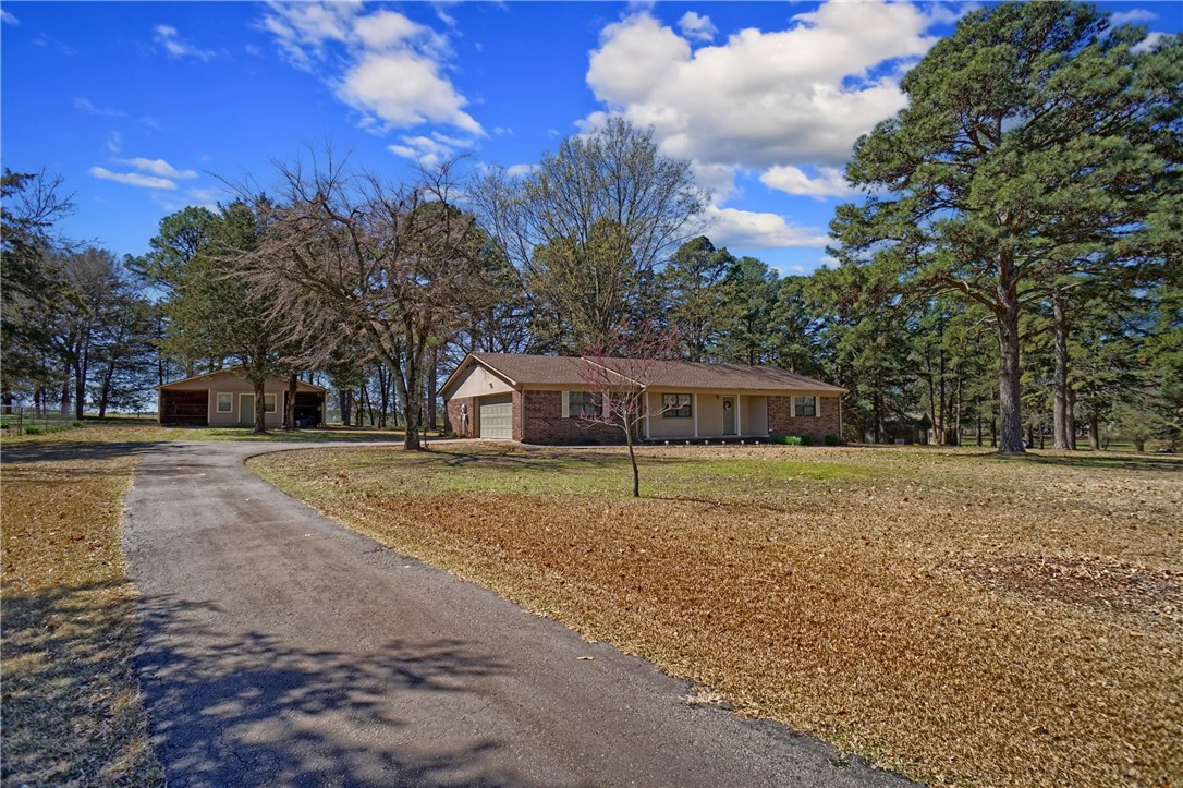 Easy Living...Discover all the comforts of this three bedroom, two bath home on 1.49 acres on Crow Mountain just minutes from town. This home features a welcoming living room, an eat-in kitchen with breakfast bar, spacious master bedroom with adjoining bath and much more. Enjoy the outside evenings on the covered patio or hanging around the fire pit. For additional space, the workshop makes a wonderful addition. The shop wired for 240v and amply utility storage around back. And the open flat yard.