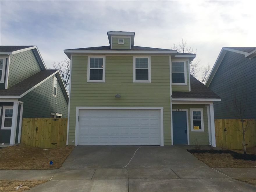 Energy efficient quality-built craftsman style home. Features 2 levels with primary bedroom/bath & half bath on main level and 2 bedrooms w/full bath on second. Laundry hookups on both levels. Other amenities include hardwood floors, granite countertops & tiled backsplash, SS appliances, tiled shower, white cabinets and walk-in closets. Front load 2 car garage. Private side patio deck and landscaped yard. POA covers lawn care & irrigation. Close to Bentonville schools, parks & community center.