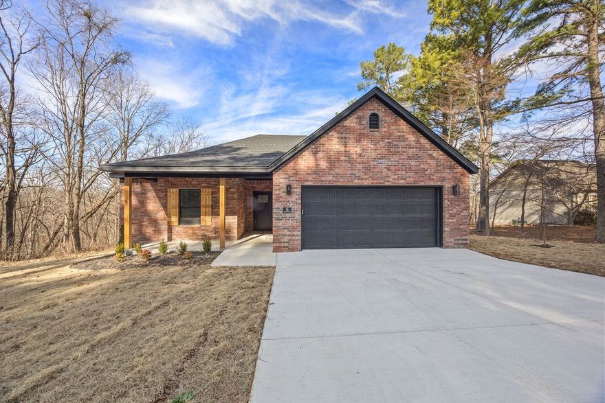 Located just a few minutes from both Granton Park & Tiree Park on Loch Lomond, and not too far from Back 40 hiking and biking trails. And a short drive back to I-49 to access everything NWA has to offer. Come enjoy Bella Vista and all of its beautiful amenities in a NEW home. Home's interior features an open layout with a large granite island, stainless steel appliances, and a pantry. LVP flooring throughout. Dedicated laundry room. Hot Water recirculation system. Builder offers a TWO YEAR warranty. Agents: See remarks and ask about other Bella Vista locations coming up!