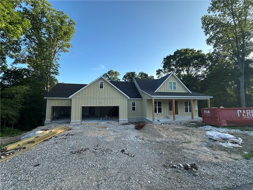 This all one level home in highly sought after Shelby Forrest subdivision is a must see. Featuring an open floor plan, lots of windows for natural light, tons of custom cabinetry and trim work, an oversized 3 car garage, large walk in closets, all hardwood flooring, and a huge deck to enjoy the outdoors. Pick colors and misc items now.