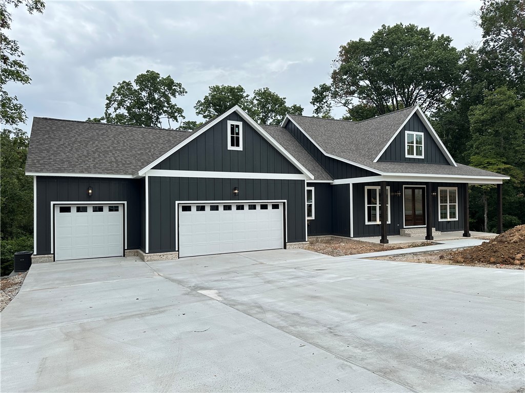 This all one level home in highly sought after Shelby Forrest subdivision is a must see. Featuring an open floor plan, lots of windows for natural light, tons of custom cabinetry and trim work, an oversized 3 car garage, large walk in closets, all hardwood flooring, and a huge deck to enjoy the outdoors. Pick colors and misc items now.