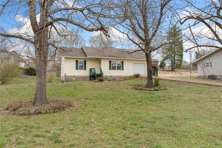 Welcome to 31 Hazelnut Circle in Mountain Home, Arkansas! This charming 3-bedroom, 2-bath home offers comfortable living in a quiet, established neighborhood. Inside you’ll find a functional layout with a bright living area, a spacious kitchen, and a dining space perfect for everyday meals or entertaining guests. A versatile bonus room provides extra space for a home office, hobby area, or additional storage with convenient attic access. Step outside to enjoy the fenced backyard—ideal for pets, gardening, or relaxing evenings outdoors. Conveniently located near shopping, dining, schools, and the beautiful lakes the area is known for, this home is a great opportunity for first-time buyers, downsizers, or investors. Don’t miss your chance to make this inviting Mountain Home property your own!