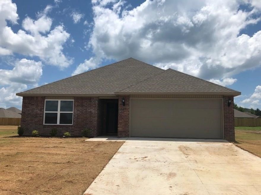 Newer construction home in Siloam Springs. Brand new subdivision. 3 bedrooms 2 baths, 2 car garages, large family room, great room includes breakfast bar, eat-in kitchen, wood floors, covered back porch with huge backyard, large master suite and master bath, walk in closets. Experience brand new living.