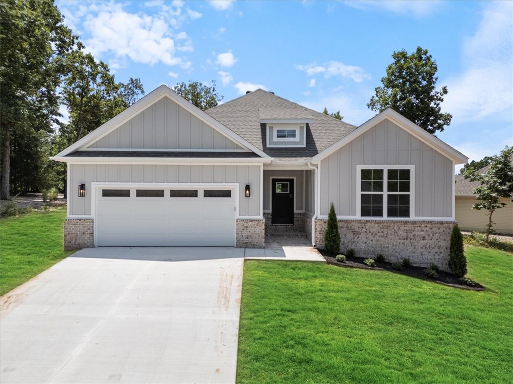 Discover your dream home that is MOVE-IN READY and a .33 acre FLAT backyard with easy access to the Branchwood Recreational Center & the interstate! This new construction home features 2 bedrooms PLUS an office and 2 full bathrooms. Step inside to find an inviting living area with soaring 10ā ceilings, complemented by upgraded finishes throughout. The kitchen boasts quartz countertops, a large island, custom cabinets with a statement hood, a gas range, stainless steel appliances, & a large walk-in pantry. Retreat to the primary bath, showcasing a spacious walk-in shower, double vanity, & generous closet space for all your storage needs. Enjoy outdoor living on the covered back patio overlooking a sizable backyard, perfect for entertaining or relaxation. Blinds and gutters included! Donāt miss the opportunity to own this exceptional home in a vibrant community.