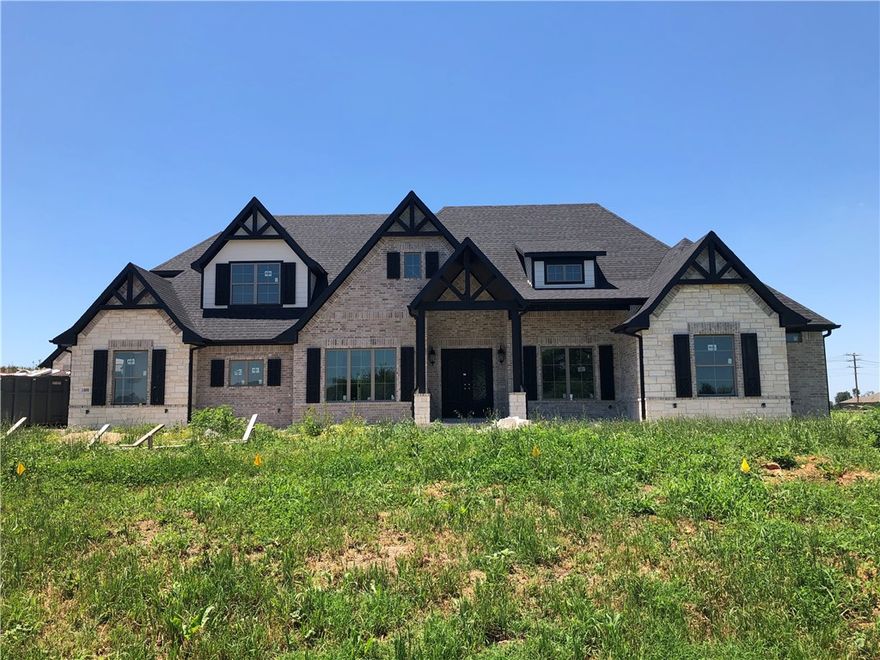 Exquisite home on a flat 1.13 acre lot in West End! 4 car garage! Walking into this home you will find a
formal dining & office on your way to the large open living room and kitchen. Ample windows fill the space with an abundance of natural light! This split floor plan also offers 4 bedrooms on the main level. Upstairs, you will find a bonus room, media room, and 5th bedroom. Hardwood in master bedroom. Complete with central vac & speakers! Outside, entertaining comes easy with the outdoor kitchen and huge backyard! West End is gated and within close proximity to Bentonville West. Estimated Completion 8/15/2021