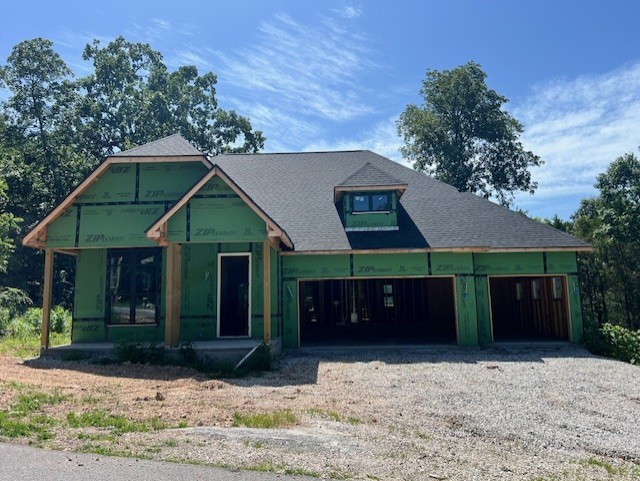 Live your best Bella Vista Life with Golf, Loch Lomond and Tunnel Vision Trails within minutes of this New Construction Home!! Filled with stunning upgraded features: High-end Quartz counters throughout, white oak cabinets on Kitchen Island and in Primary Bath, Built-In Beverage Center with undercounter wine/bev fridge, and a gorgeous, covered deck with integrated heaters to keep you warm in those chilly Winter months! This home features 3 Bedrooms, 2.5 baths plus an office, abundant storage and customs built-ins, a spacious 3-car garage