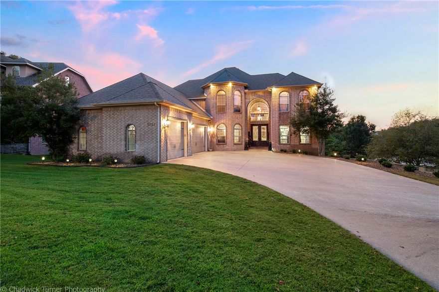 Combining Quality, Luxury, Design and Comfort, this one-owner home truly has it all. Not one detail was missed for entertaining and comfortable living in this captivating home. Once you enter the home, you are greeted with soaring ceilings and expansive windows with views you can enjoy year-round. Bring out your inner chef in this gourmet kitchen featuring SS appliances, under cabinet lighting and a large prep island.  Soak up the serenity in the spa like master suite with sitting area, large soaker tub, and walk-in closet that even a princess would delight in. Entertainers dream destination in this walk-out boasting wet bar w/wine fridge, theatre w/elevated reclining seating, 2nd living space, two bedrooms, & abundant storage.
A mountain and road bikers dream with Greenway access and mountain bike trails moments from the neighborhood. Located just 4 miles from Downtown Bentonville with easy access to I-49. New Roof and Gutters in 2021.