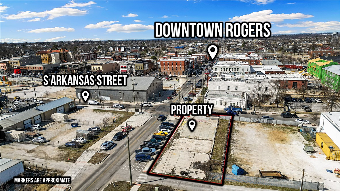 Prime hard corner development lot in rapidly growing and thriving Downtown Rogers. T5.2 zoning allows for high density development with multiple uses. Positioned in the middle of several active and future development projects, this site provides unlimited investment opportunities.
Accepting offers: proof of funds and intended use required with offer submitted.
Also listed under MLS: 1301467
