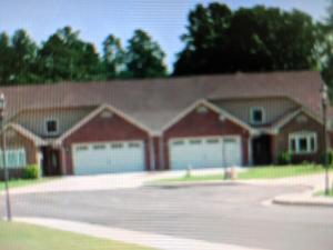 Condo living at its best with a boat dock and Security gate.