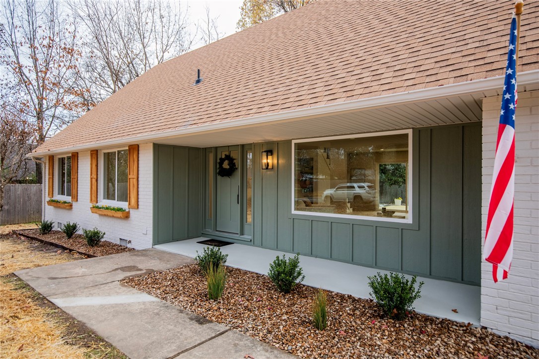 Charming midtown renovation by Nall Custom Homes and ReJennaRation! This house has been completely remodeled - features new energy efficient doors and windows, luxury vinyl plank, cast stone fireplace, new interior doors and trim, and designer lighting throughout. Fabuwood stained cabinetry, a spacious laundry room with a folding table, floating white oak shelving, all new Delta and Kraus plumbing fixtures. The primary suite has a large walk-in shower with frameless glass, two closets, and grasscloth wallpaper. The dining/breakfast room is a beautiful space for family meals with large windows, brick and wainscoting detail, plus pass through bar seating. The second floor features a spacious second living area with a floor to ceiling picture window overlooking the pool, two bedrooms and a full bathroom. Full energy audit performed and all recommended upgrades were completed. The backyard is large and flat with a concrete pool and wood deck, plus still plenty of yard space for other activities!