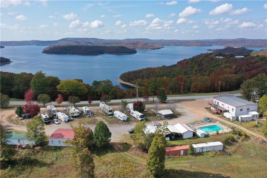 This is your chance to own an established & successful business with a little piece of paradise! Rated the #1 Dive resort on Beaver Lake with 6 fully furnished motel rooms, 1 master suite, owner quarters, & 16 bunk rooms with total sleeping capacity for 98 guests, 28 RV sites with dump station, & recreational camp sites with available shower house & bathrooms. PADI Certified 5 Star Instructor Development Center providing a full range of scuba diving education programs & Onsite Dive Center providing recreational diving & equipment sales located only 1.5 mi from Beaver Dam. Onsite Convenience Store serving Hunt Brother’s Pizza, Flavorburst soft serve ice cream, groceries, beer, camping supplies, archery supplies, & fishing gear. Nationally recognized as great place to dive; Beaver Lake has many wrecks, outstanding visibility, & easy access. Property boasts over 400' of Major Road Frontage in addition to a commanding view of Beaver Lake! Great cash flow & endless possibilities to expand on a fantastic 9-ac. property!