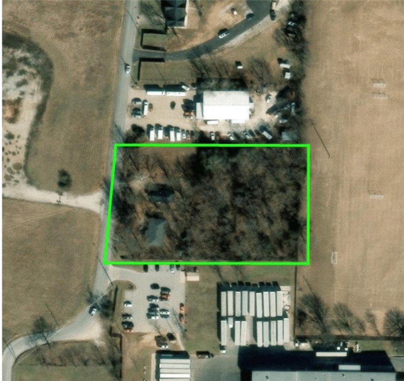 Situated on a 2-acre lot, this property includes two existing homes in need of renovation—both being sold as-is. Zoned I2 (Industrial), this site is ideally suited for general industrial use, manufacturing, trades/services, warehousing, and similar commercial operations. Residential use is not permitted unless a rezoning is approved by the city. Excellent potential for redevelopment!