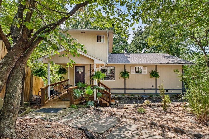 Lakeview Retreat. Enjoy the beauty of this Beaver Lake home tucked away at the end of a quiet cul-de-sac. Step inside to find a bright, open layout on the main level w/a great room which includes the living, dining and kitchen areas, office, full bath and laundry.  On the upper level is a private owner's suite. On the lower level are 2 bdrms, 1 ba, workshop and laundry, all of which provide flexible living space for family or guests. Walls of windows showcase the expansive double decks, mature oaks, a lovely water view and sunsets creating a peaceful and private setting while still offering the convenience of a paved road location.
Recent upgrades are new roof, new HVAC and new 50-gallon water heater for worry-free living. The kitchen features all stainless-steel appliances, and you’ll appreciate the convenience of two laundry setups.
Whether you’re enjoying morning coffee on the deck, hosting gatherings, or watching the sunset over the water, this home captures the essence of lake area living.