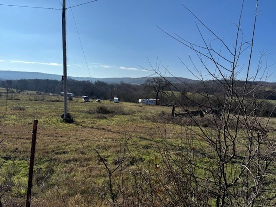 Great open piece of land in the private community of Morrow.  A running creek runs along property to the West.  Build your little house on this wonderful land. More land available. Agent Owned. See MLS 1295454, 1295464, 1295469