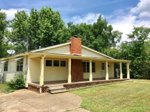 Hot summers stand no chance...with new HVAC and attic insulation recently added to this adorable home in Clarksville. A front covered porch and large fenced lawn add to the charm. Eat-in kitchen w/ an abundance of cabinetry & and breakfast bar. Large living room w/ fireplace. Fresh paint and carpets just cleaned. Add this home to the must see list. Note: 3rd bedroom has w/d hook-ups or relocate to original garage location.