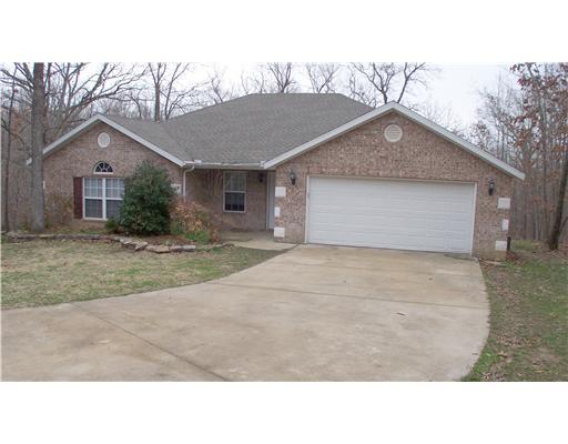 BEAUTIFUL HOME IN BELLA VISTA THAT FEATURES 3 BEDROOMS, 2 FULL BATH,GAS LOG FIREPLACE, REAR DECK, LARGE BEDROOMS