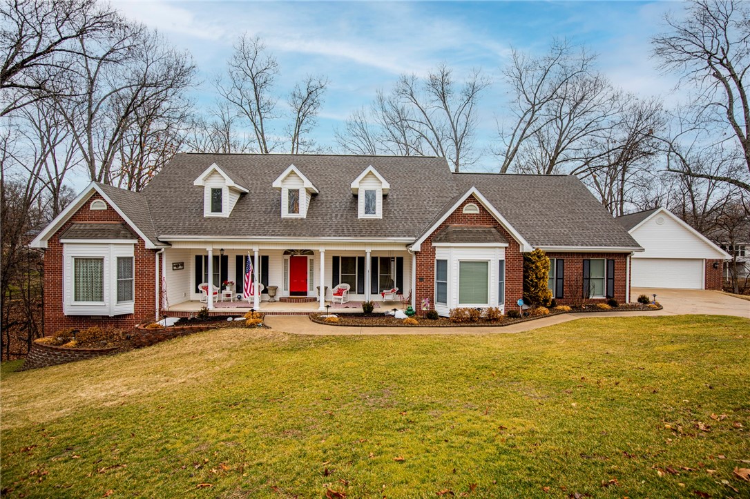 This stunning custom built two-story home is on a large 1.25 acre lot in a hot neighborhood. The backyard is private, and beautifully landscaped with large deck, gazebo and sunroom to enjoy it. From the kitchen with a large gas cooktop, and multiple living spaces to the additional detached 2 car garage/shop space with epoxy floor, there is plenty of room for the whole family to enjoy. Situated in a family-friendly neighborhood near a great parks, walking trails, downtown Bentonville, this home is sure to go fast! New HVAC in 2021