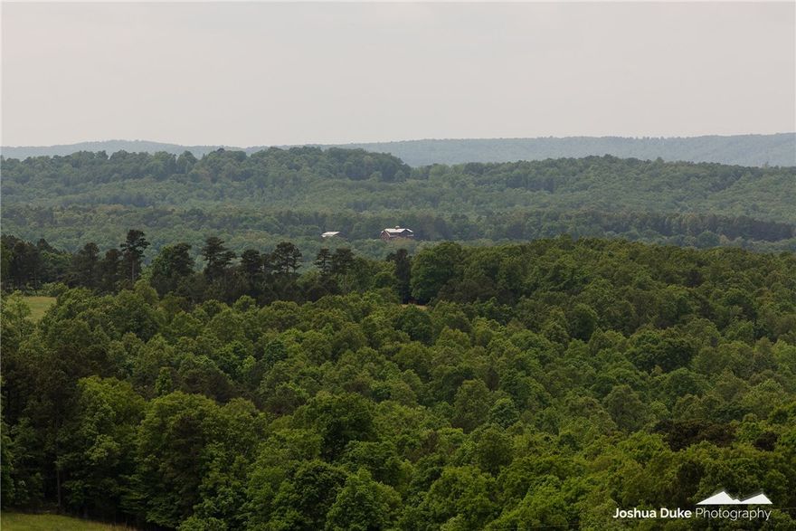 Opportunity to own 600 Contiguous acres abundant with whitetail deer, eastern wild turkey, and much more wildlife.  This property features areas cleared for food plots, established trails and roads, ponds, seasonal creeks and mature hardwoods.  Originally part of the JC Ranch which contained an additional 90 acres and lodge that has been sold.  This property has two gated entrances to the county road for access.