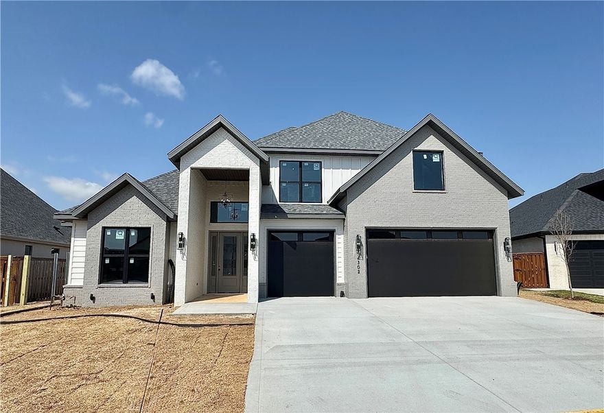 $3,000 preferred Lender credit to Buyer. Unbelievable floor plan with two story living room in the gated community of Scissortail. Kitchen has custom beams, large island with veggie sink, double ovens, walk in pantry, tons of cabinets and storage. Two story living room with corner fireplace & windows open to covered patio. Large mud room with cubbies and a spacious laundry room with sink and counter space. Large luxurious primary bedroom with beautiful ensuite bathroom boasting double sinks, soaking tub, walk in tile shower, and massive walk in closet. Secondary bedroom on the main level that would be a perfect study. Large bonus room on the second level with built in wet bar, perfect for entertaining. Great patio overlooking the large fully fenced backyard. Conveniently located within walking distance of the Bentonville Schools. Scissortail residents have access to TONS of community amenities including gated community, clubhouse, adult pool, family pool, exercise room, playground, firepit and sports court.