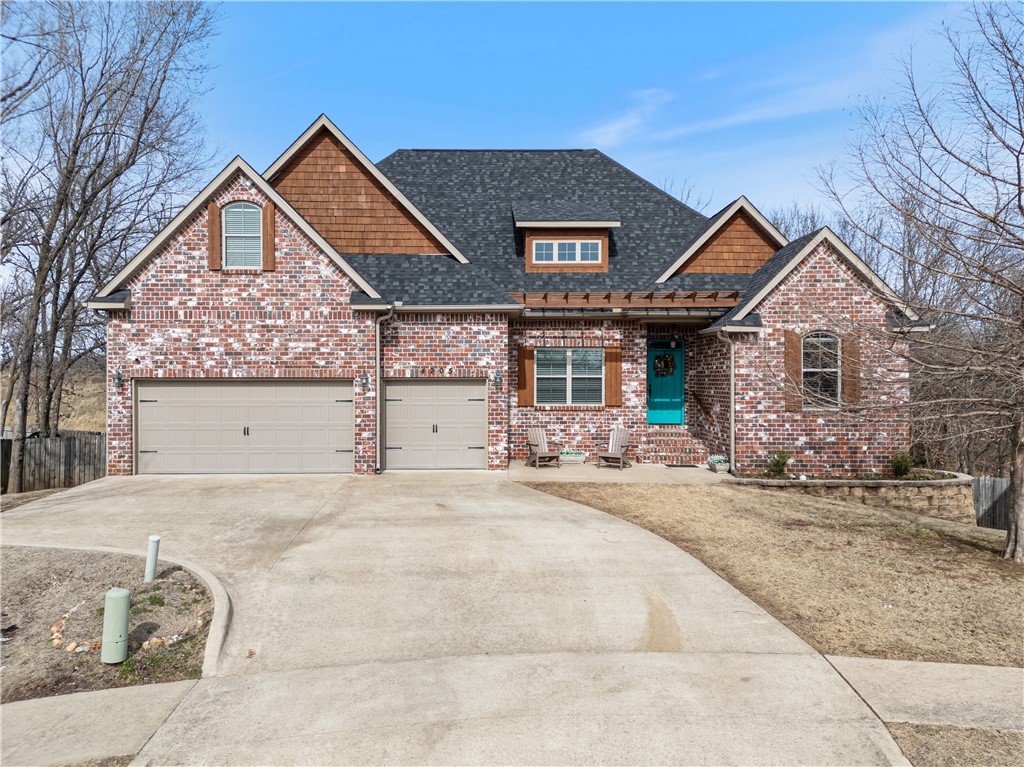 PRICE IMPROVEMENT! MOTIVATED SELLERS! Nestled in the highly sought-after Kensington subdivision, this stunning 6 bed, 4 bath home offers the perfect combination of space, comfort & convenience. Located on a quiet cul-de-sac, it is a peaceful retreat while being just 5 mins from the Walmart Home Office and only 2 mins from I-49, making commuting a breeze. There are also many great Bentonville schools nearby!
The layout includes 3 living areas: a welcoming main-floor living room with wood beams, built-ins & a fireplace, plus an enormous lower-level family room with a kitchenette in the walkout basement, & a cozy upstairs den. The main floor features a spacious master suite & an additional bedroom, while 2 more bedrooms are located upstairs and 2 downstairs. Outside there is a roomy 2-level back deck that overlooks beautiful, wooded surroundings, where a variety of birds visit often. New roof 2023, cedar & deck treated 2023, new dishwasher 2025. Storage galore, don't miss this beauty!