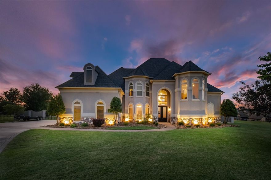 Experience luxury and laughs in this 5-bedroom, 3.5-bath gem in Bentonville Schools district. Set on a sprawling .86-acre yard, it features a heated/cooled gunite pool with a fountain, hot tub, and poolside surround sound for your epic cannonball playlist. With two living rooms, a bonus room for your quirky collections, and an office for your “serious” moments, there’s space for everyone. Large windows flood the home with sunlight, highlighting its jaw-dropping curb appeal. The seamless floor plan flows effortlessly, perfect for entertaining or pretending you’re on a home design show. This house combines luxury with a splash of humor—make it yours today!