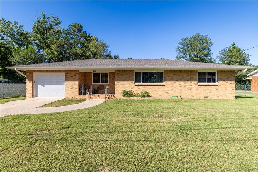 Back on Market; No Fault to Seller. Spacious all brick home w/bonus flex bldg in Pea Ridge! Step into this charming 3BR/2BA home w/thoughtful updates. Recent improvements: new roof on home & outbuildings, new sewer/water lines under the home (2023) new sewer line in yard to street (10/2025) new windows, storm door &  insulated garage door (2024). The kitchen shines with a new oven w/air fryer & faucet (2023), newer gas cooktop & vent. Classic wood floors & tankless water heater complement the home. Fully fenced yard features not one, but two bonus structures; 390 sq. ft. “man cave” with its own tankless water heater, new vanity, doors, toilet, epoxy flooring, & plumbing for a future kitchenette & shower, plus a 8x12 shed for tools/storage. Whether you need extra living space, gym, office, or creative studio, this property offers significant versatility. A quiet & convenient location close to downtown Pea Ridge, schools, and shopping. This home is super cute and ready for your personal updates to make it your own!