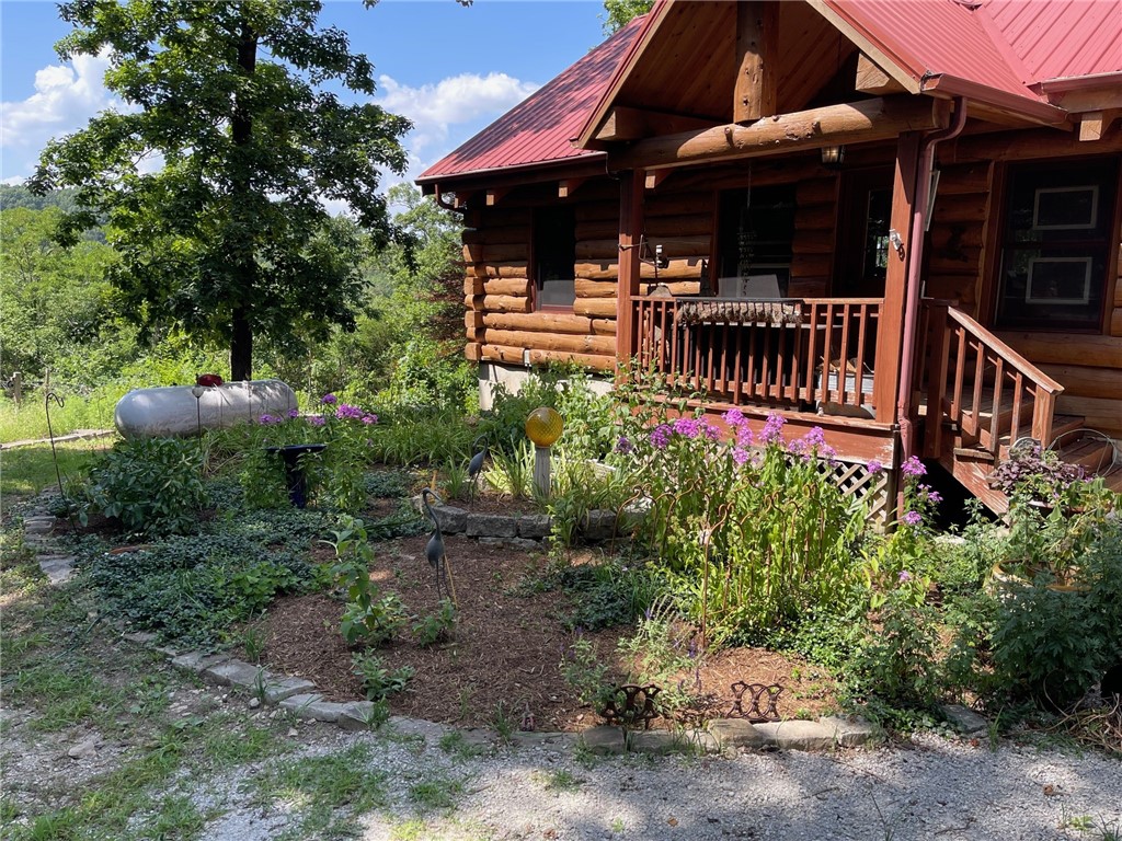 Charming Country Retreat with Modern Comforts!
Welcome to your dream home nestled in the heart of serene countryside living! This beautiful 3-bedroom, 2-bathroom log home sits on 14 acres m/l with mature trees, open skies, and room to breathe.
⢠Inviting Front Porch ā Perfect for morning coffee or evening relaxation with peaceful views.
⢠Open-Concept Living Area ā Bright and airy with large windows, and a cozy fireplace.
⢠Outdoor Living Space ā Includes a large deck and shaded backyard ideal for entertaining, gardening, or simply enjoying nature. Home is constructed with Douglas fir logs and spruce wood for floors
This property offers the perfect blend of rural charm and contemporary updatesāideal for families, retirees, or anyone seeking a peaceful lifestyle without sacrificing modern conveniences. This home offers a back-up generator and solar panels.
Donāt miss your chance to own this unique gem! Located near Table rock lake, Kings River, Eureka Springs