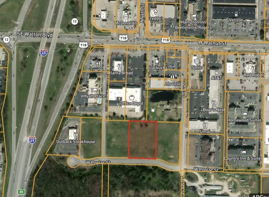Great location to develop into a business. Viewable from I-49 Northbound at Exit 85. 2024 I-49 traffic count of 109,000. Walnut in Rogers traffic count of 29,000-34,000. I-49 northbound, exit 85 traffic count of 14,000. No Seller Property Disclosure on vacant lot. Owner is related to a licensed real estate agent with Grandview Realty LLC. Taxes are based on the land only and will increase when re-assessed.