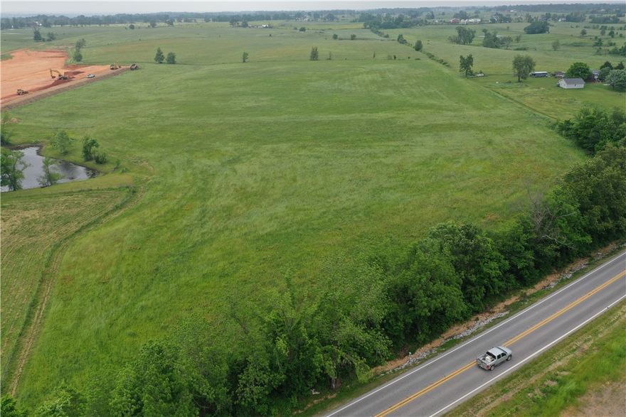Build your dream home on this amazing 5-acre parcel with highway 264 frontage. Well and septic needed.
Located in the center of NWA giving you easy access to everything that NWA has to offer. Located minutes to XNA airport and minutes to the new highway 612 bypass.