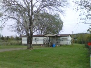 Check out this Mobile Home on a nice secluded lot in Plainview. 2 Bed/2 Bath and needs a little work. Great lot location, on a quiet street. Great investment opportunity. Call Today.