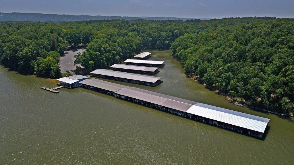 Fantastic opportunity to own a thriving marina on Beaver Lake. 161 covered slips, 97% occupancy & trailer storage, convenience store, 8 gas pumps, room to expand x spaces. All docks have electricity, lounge area on each dock.